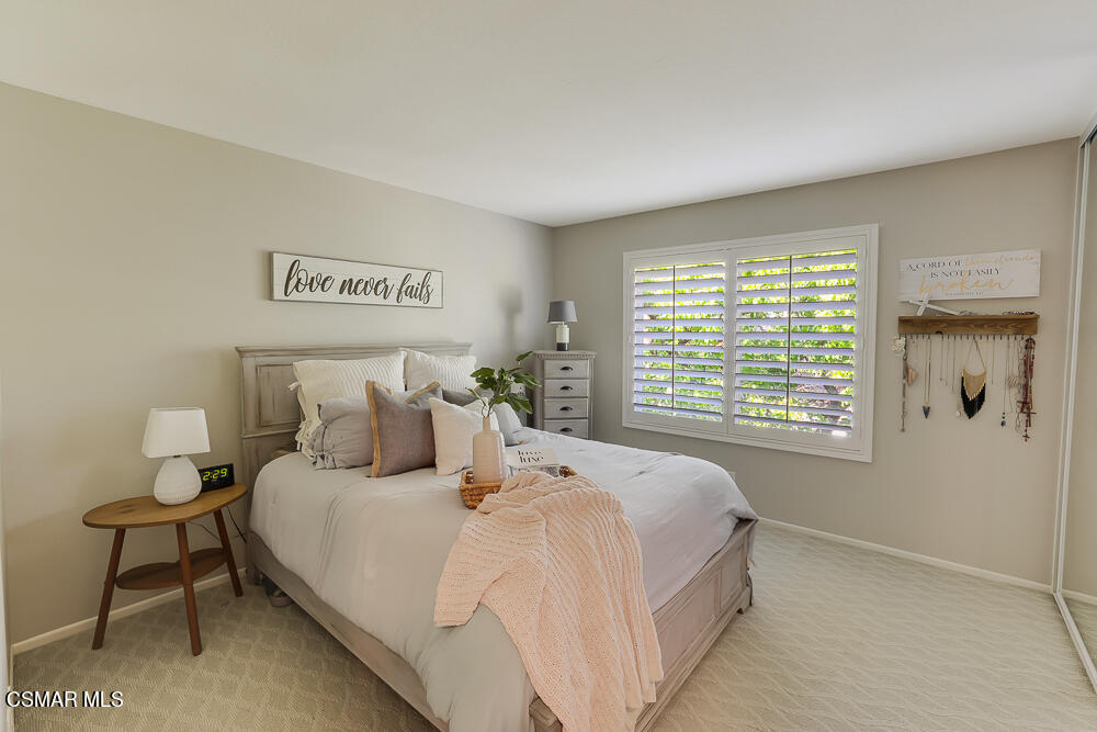 4051 Doneva Road Moorpark, CA 93021 - Photo 23 of 52 a bedroom with a bed and next to a window