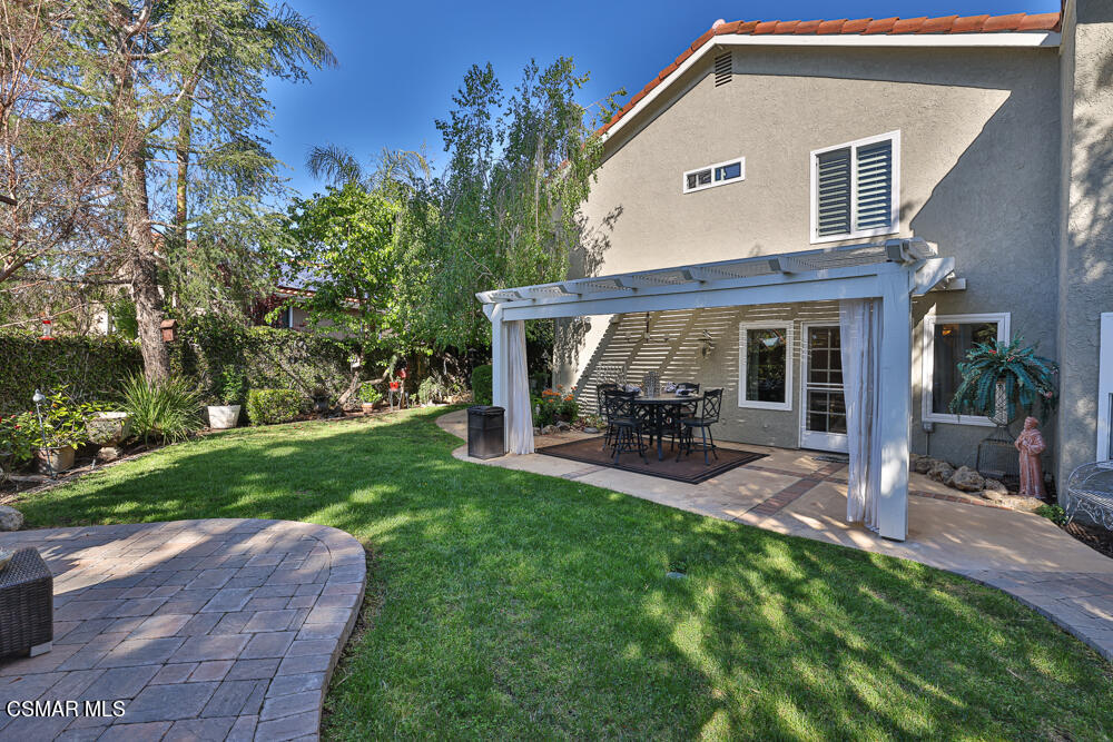 4051 Doneva Road Moorpark, CA 93021 - Photo 41 of 52 a view of a house with a yard porch and sitting area