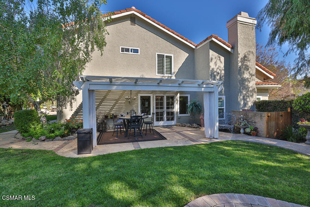 4051 Doneva Road Moorpark, CA 93021 - Photo 42 of 52 a view of a house with a yard and sitting area