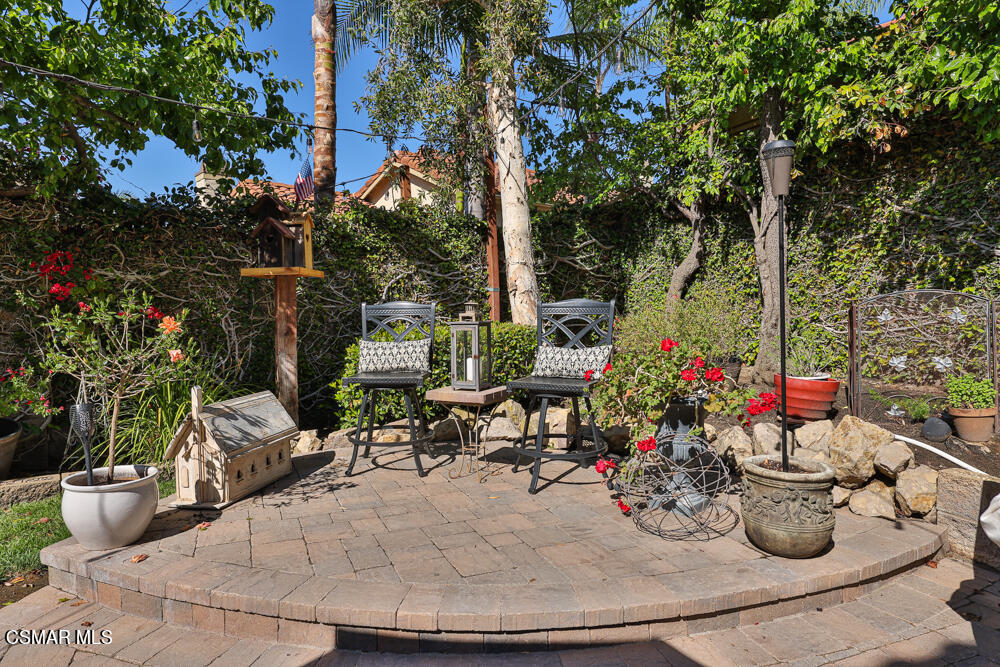 4051 Doneva Road Moorpark, CA 93021 - Photo 45 of 52 a view of a backyard with sitting area and garden