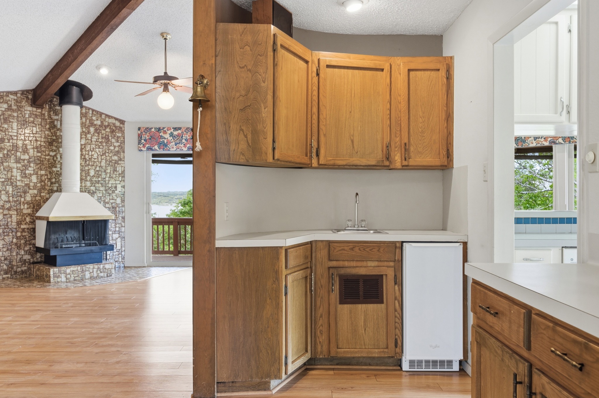 4831 Eck Lane Austin, TX 78734 - Photo 12 of 27 a kitchen with stainless steel appliances granite countertop a stove a sink and a microwave