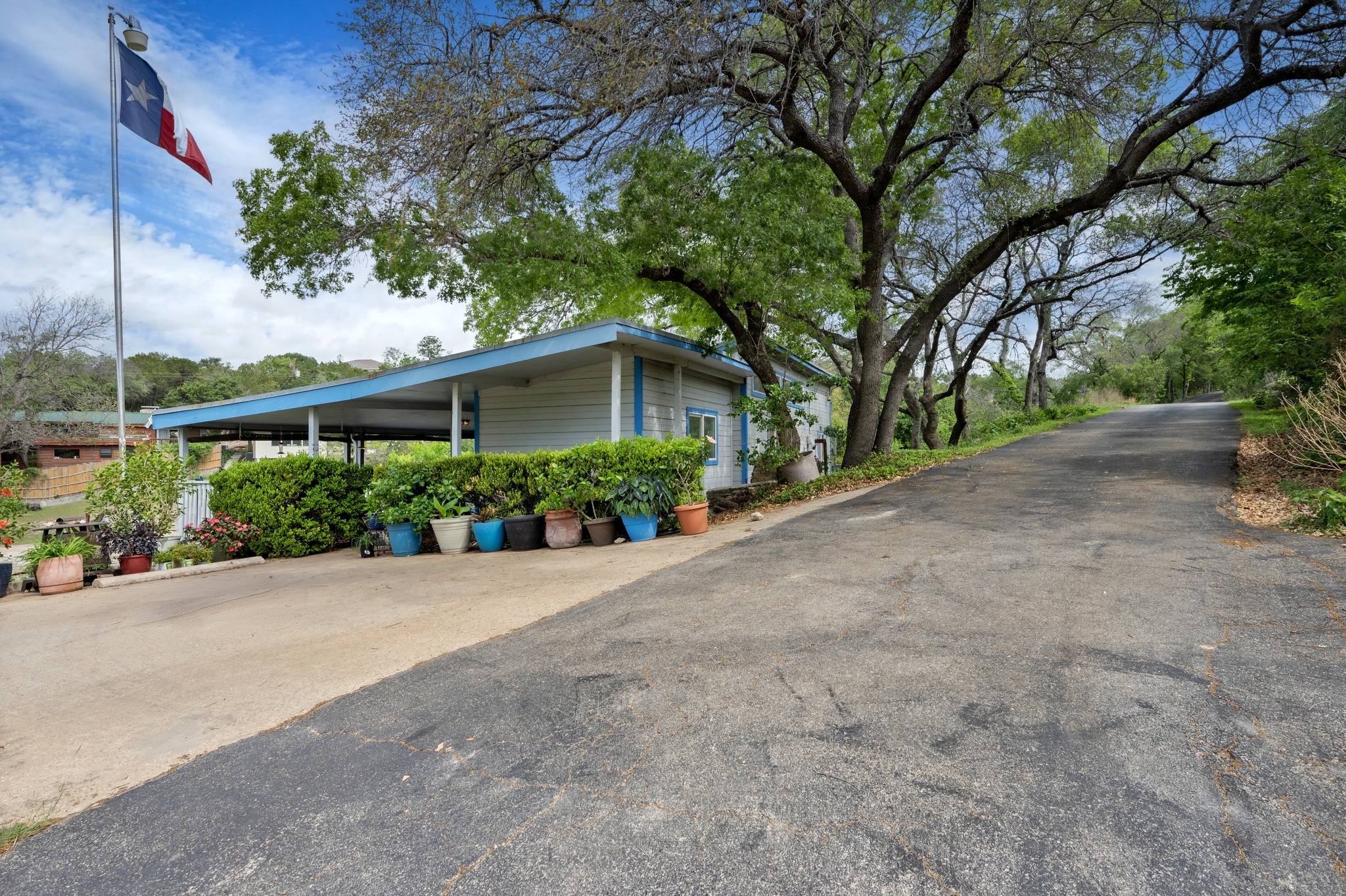 4831 Eck Lane Austin, TX 78734 - Photo 21 of 27 a view of a house with a street