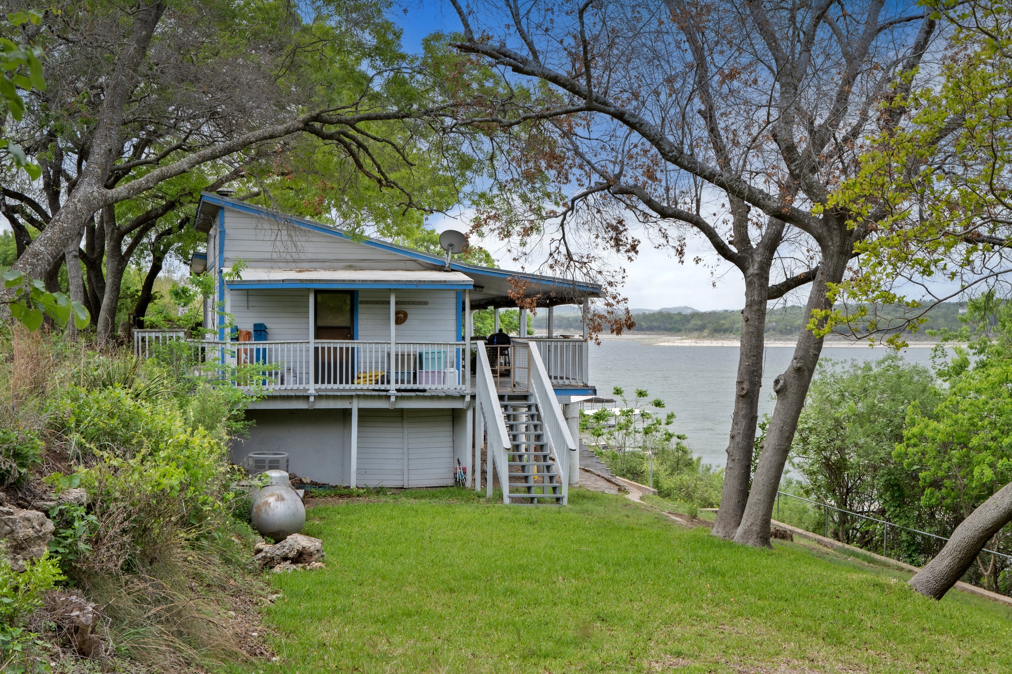 4831 Eck Lane Austin, TX 78734 - Photo 22 of 27 a view of a house with backyard