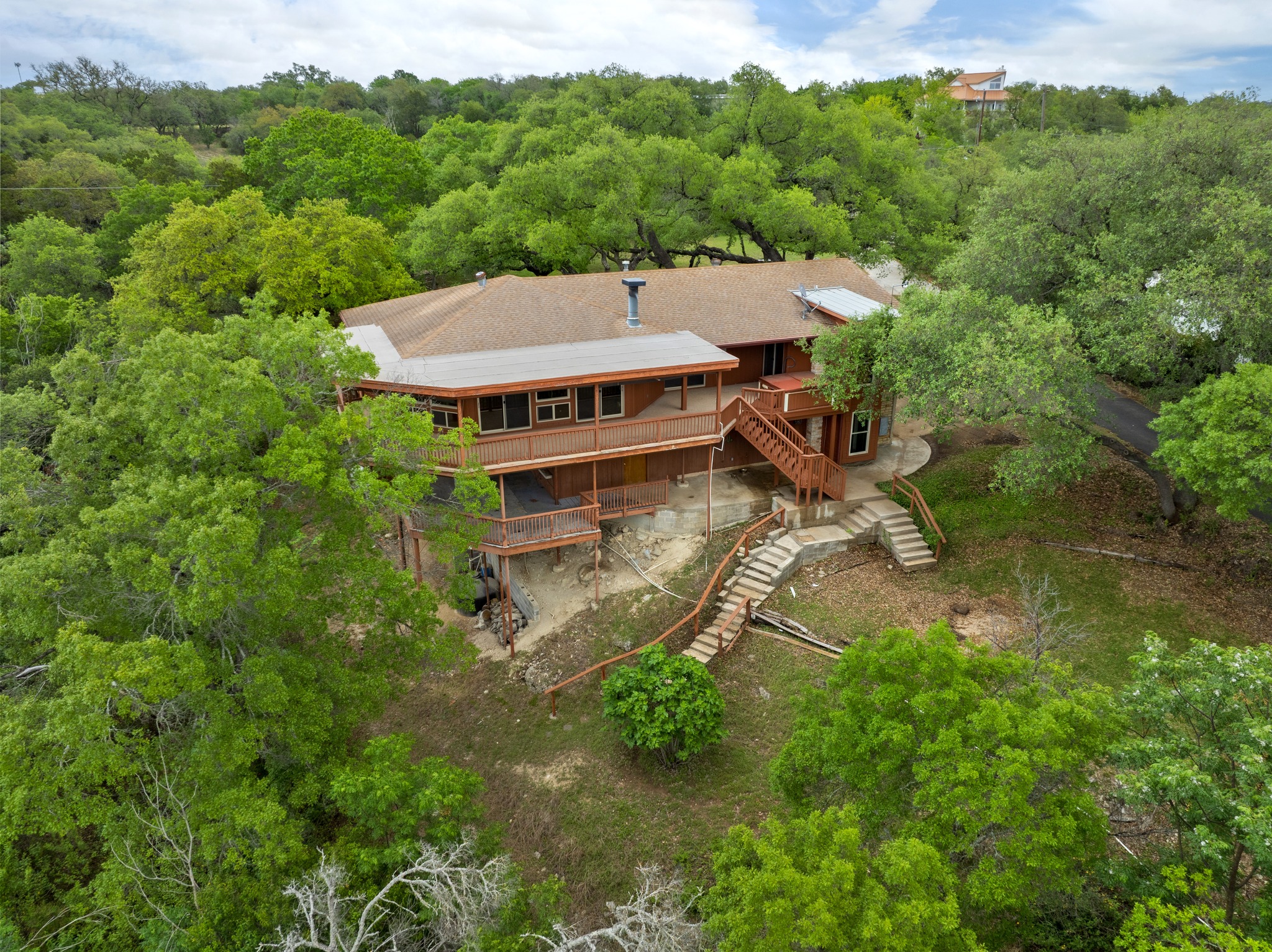 4831 Eck Lane Austin, TX 78734 - Photo 25 of 27 an aerial view of a house with pool