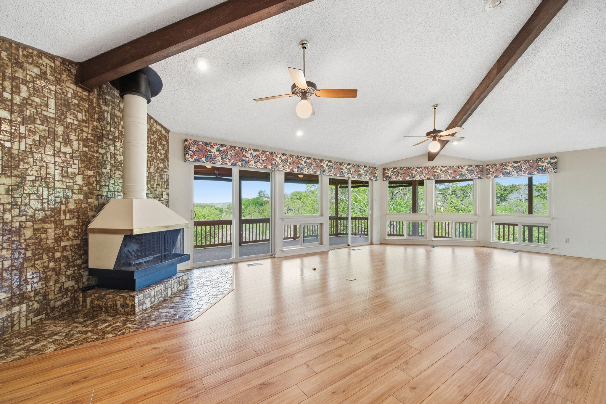 4831 Eck Lane Austin, TX 78734 - Photo 10 of 27 a view of an entryway with wooden floor
