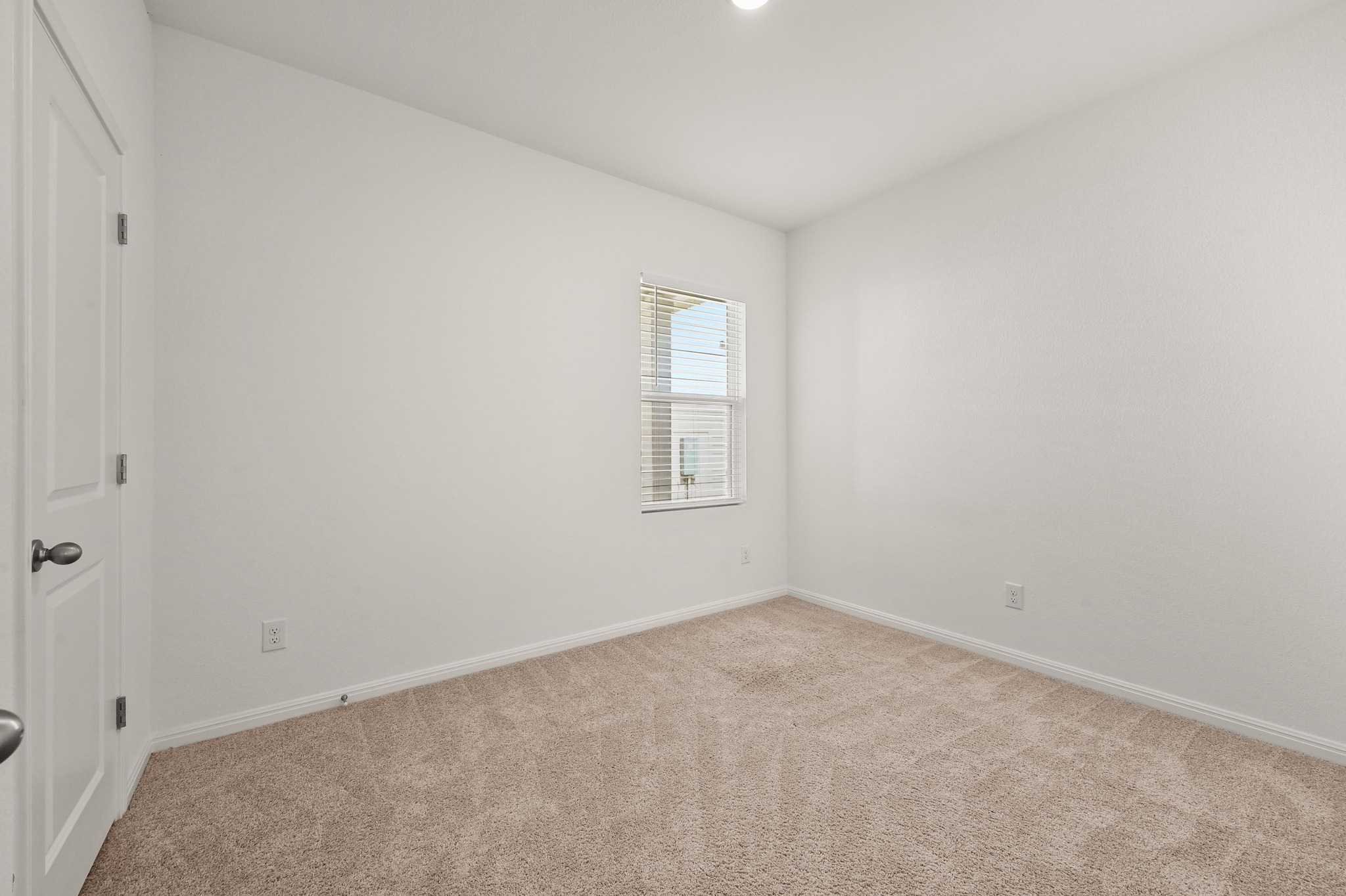 473 Thistle Lane Maxwell, TX 78656 - Photo 17 of 25 Carpeted spare room featuring baseboards