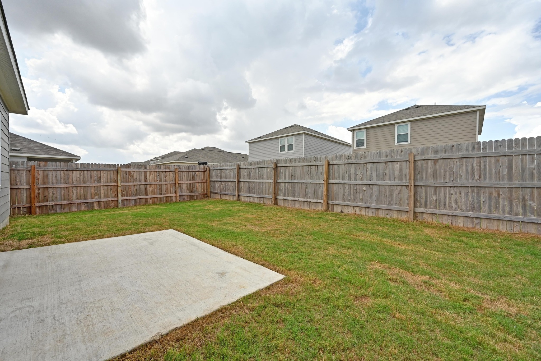 473 Thistle Lane Maxwell, TX 78656 - Photo 21 of 25 Fenced backyard featuring a patio area