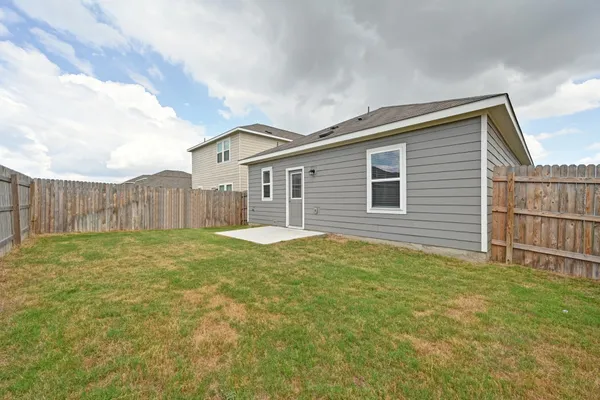 a view of a backyard with a garden