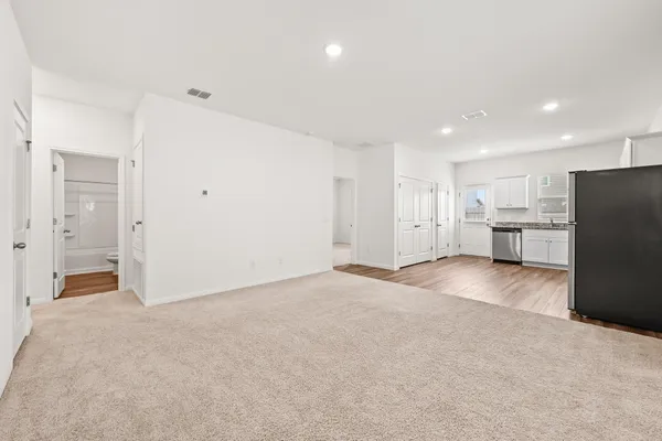 a view of a kitchen with refrigerator and yard