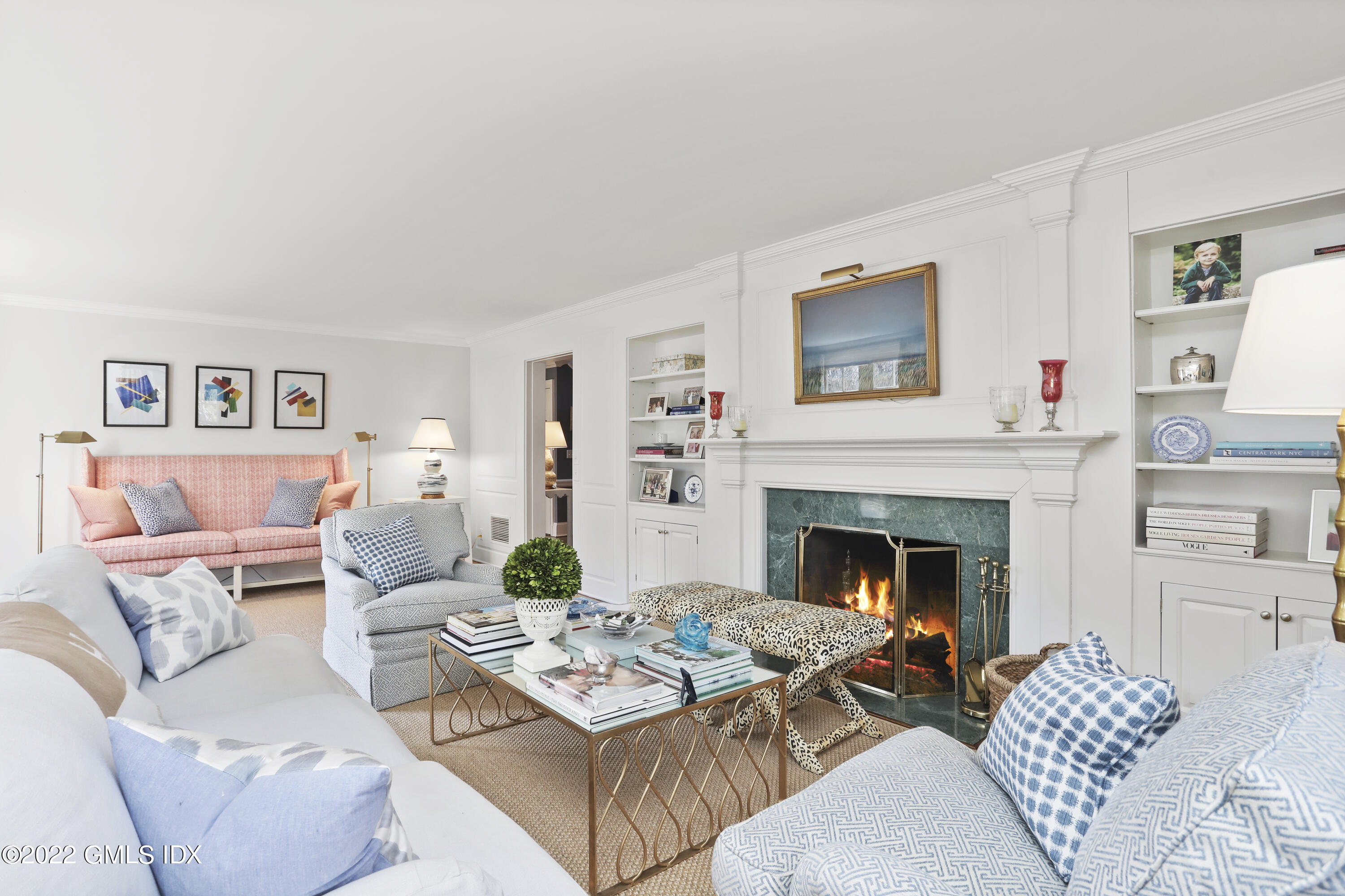144 Pecksland Road Greenwich, CT 06831 - Photo 11 of 49 a living room with furniture and a fireplace