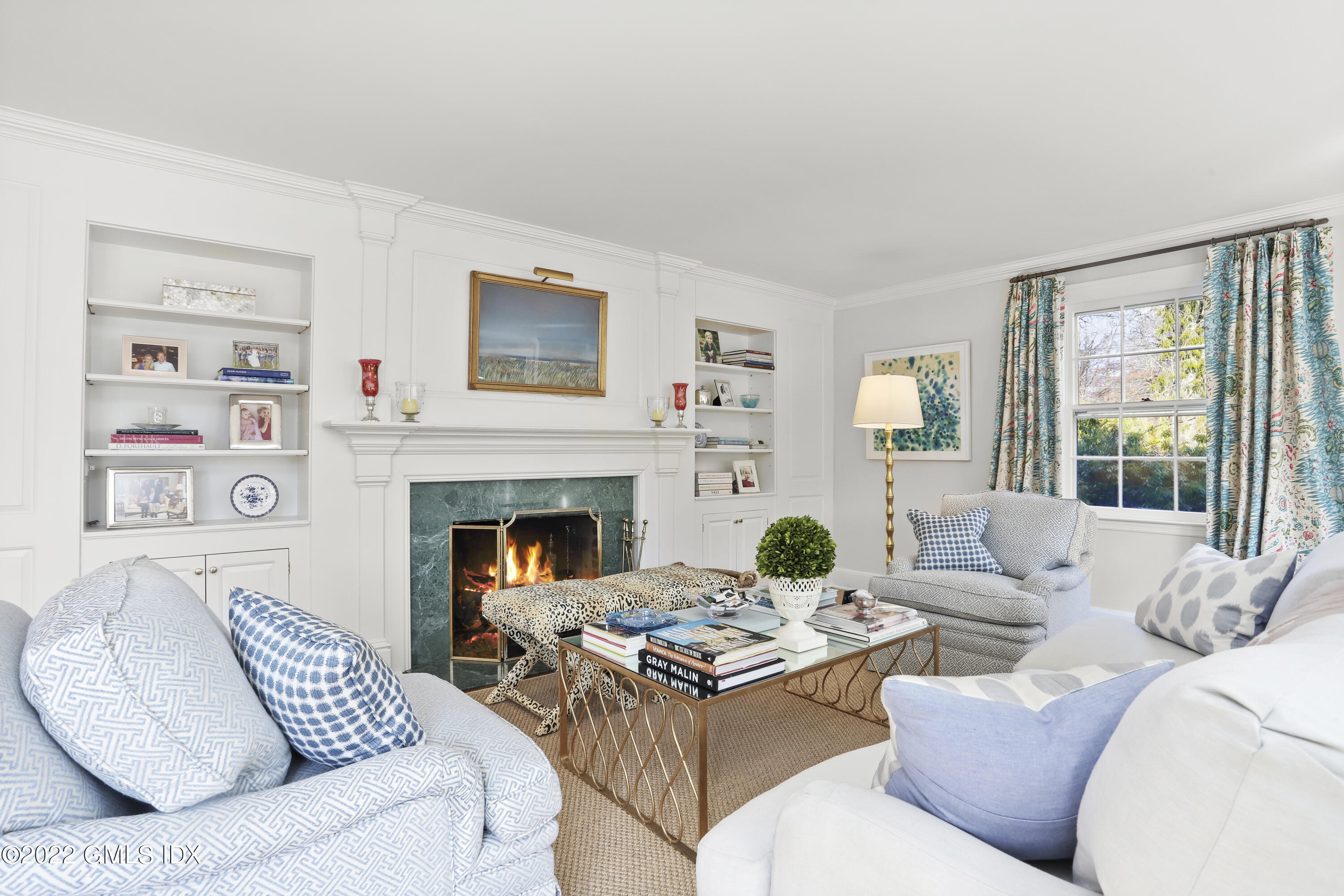 144 Pecksland Road Greenwich, CT 06831 - Photo 12 of 49 a living room with furniture and a fireplace