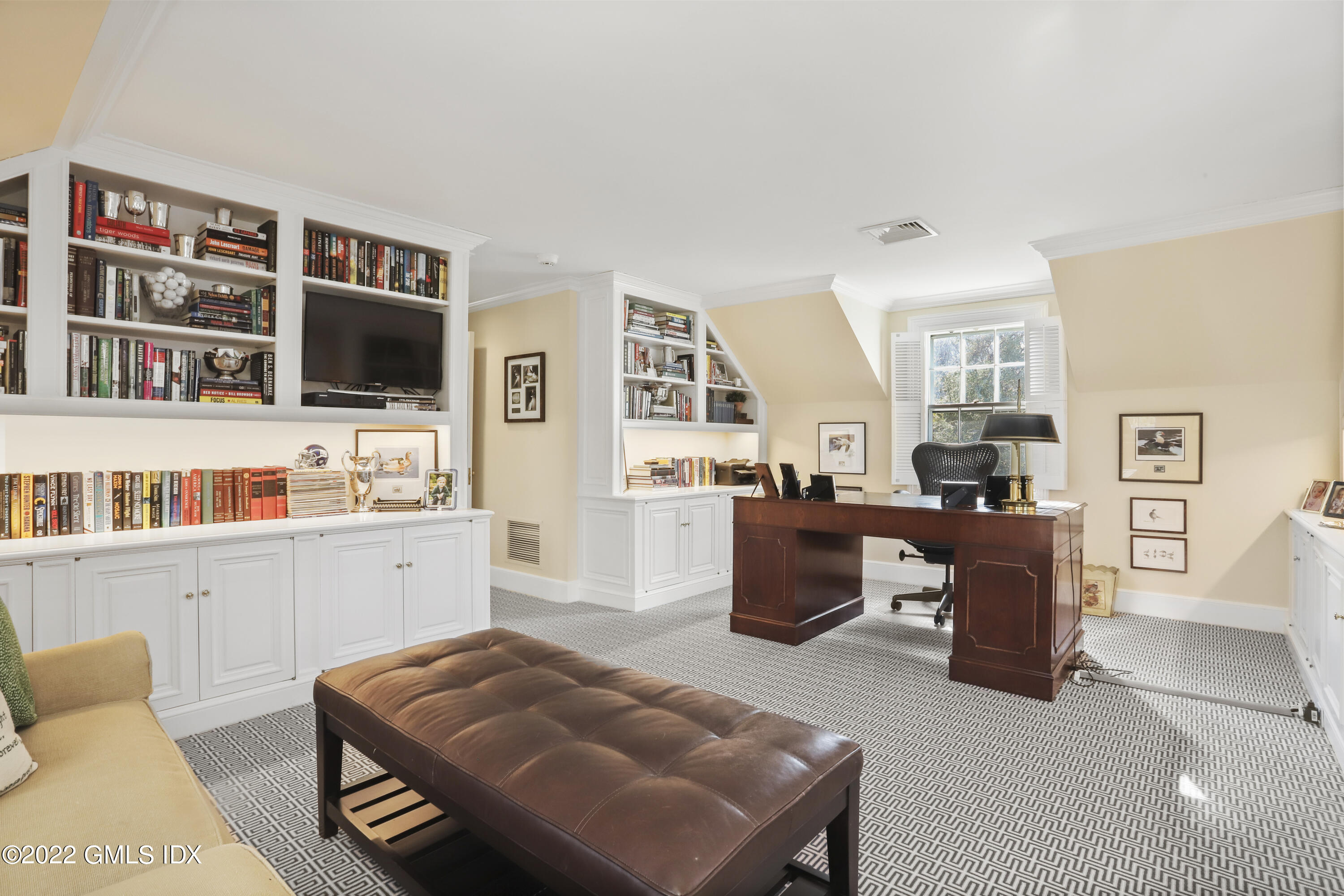 144 Pecksland Road Greenwich, CT 06831 - Photo 30 of 49 a living room with furniture and a flat screen tv