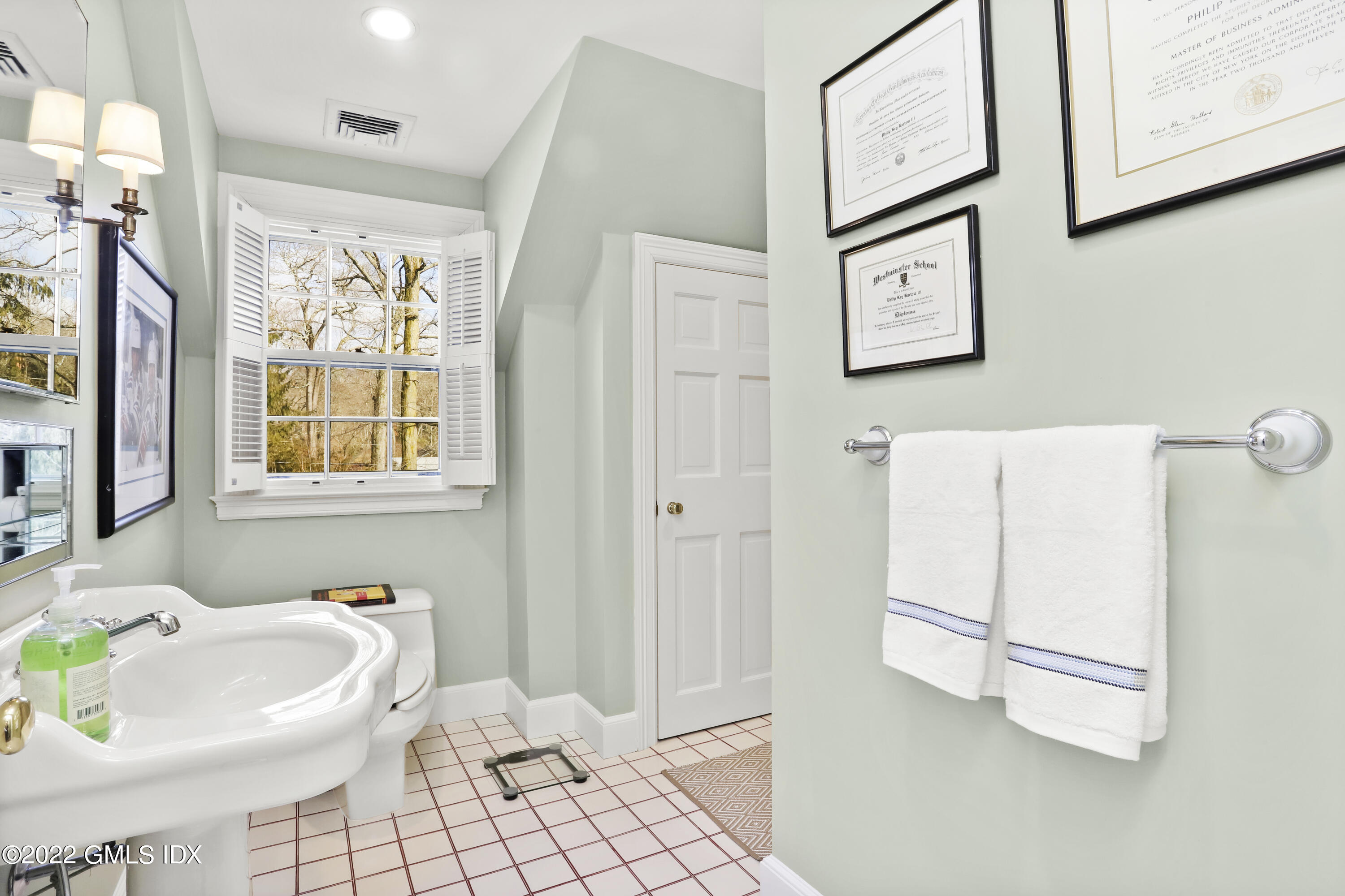 144 Pecksland Road Greenwich, CT 06831 - Photo 31 of 49 a bathroom with a sink toilet and shower