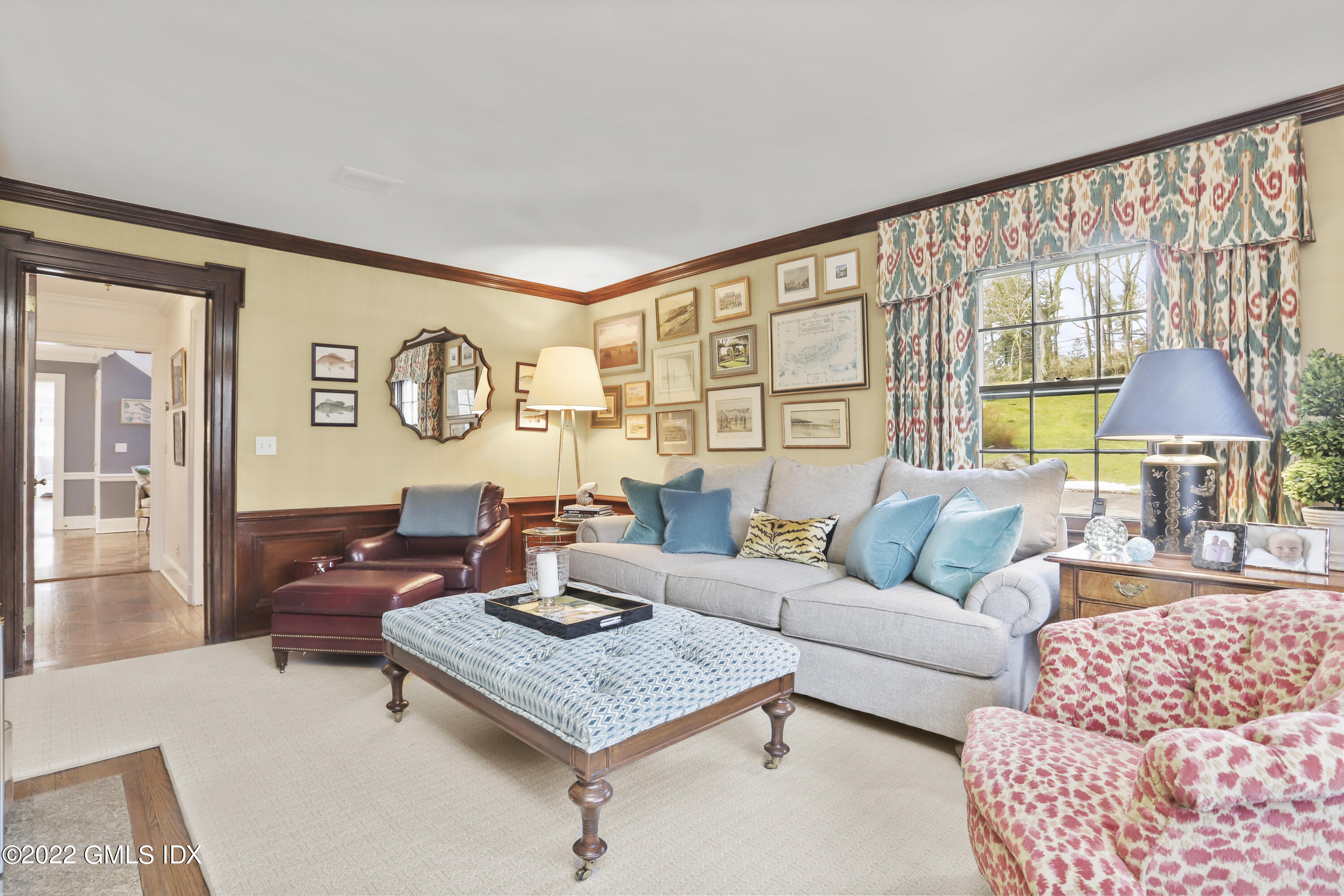144 Pecksland Road Greenwich, CT 06831 - Photo 10 of 49 a living room with furniture and a large window