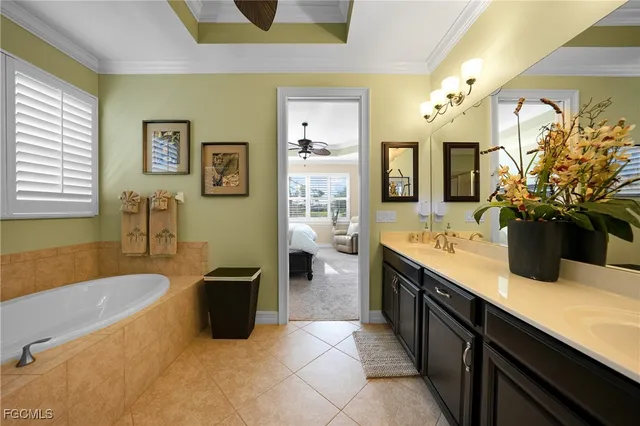 a spacious bathroom with a shower a sink and a mirror