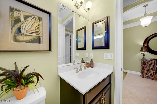 a view of a porch with chairs and backyard