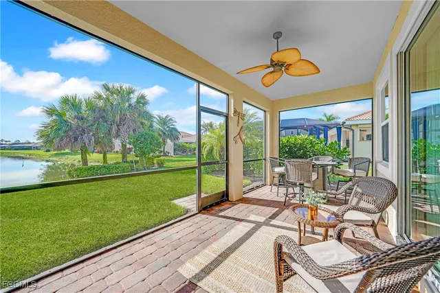 a view of a patio with a table and chairs