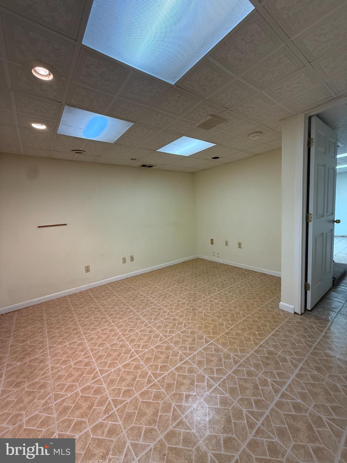 2732 Old Welsh Road Willow Grove, PA 19090 - Photo 12 of 18 an empty room with a projector