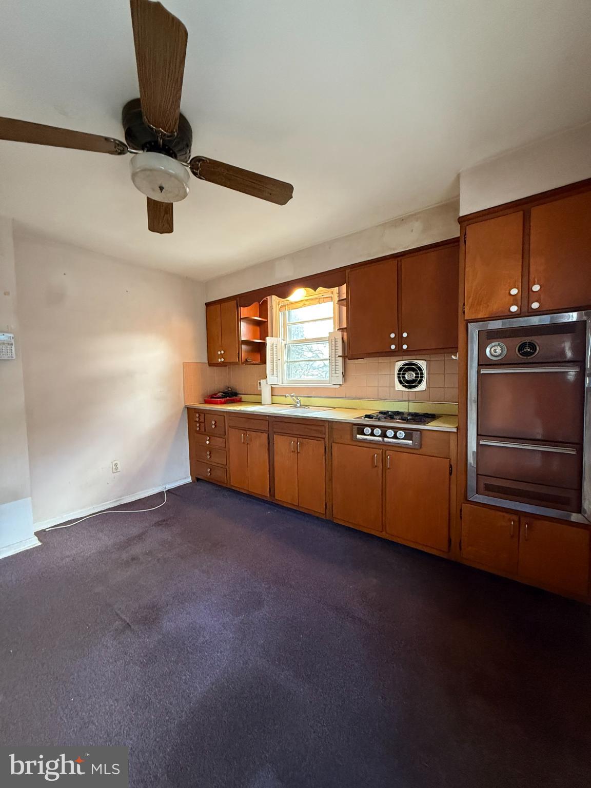 2732 Old Welsh Road Willow Grove, PA 19090 - Photo 5 of 18 a kitchen with stainless steel appliances a stove and a refrigerator