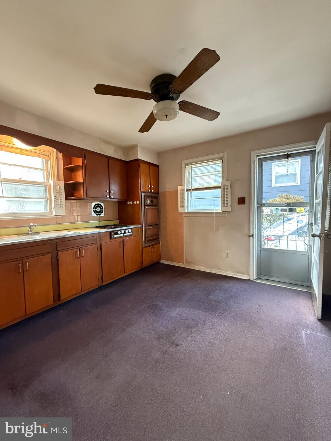 2732 Old Welsh Road Willow Grove, PA 19090 - Photo 6 of 18 a view of an empty room with a window and kitchen