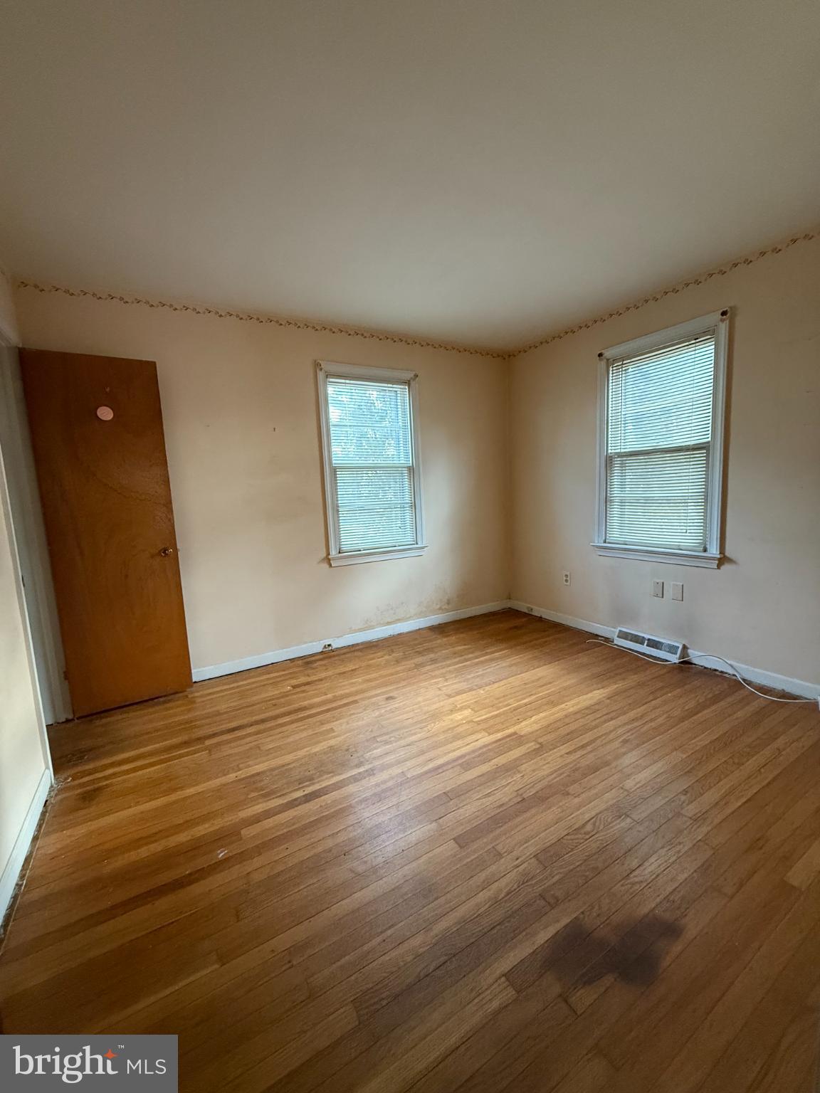 2732 Old Welsh Road Willow Grove, PA 19090 - Photo 10 of 18 an empty room with wooden floor and windows