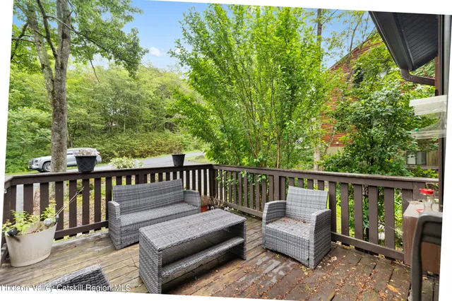 a view of a two chairs in the deck