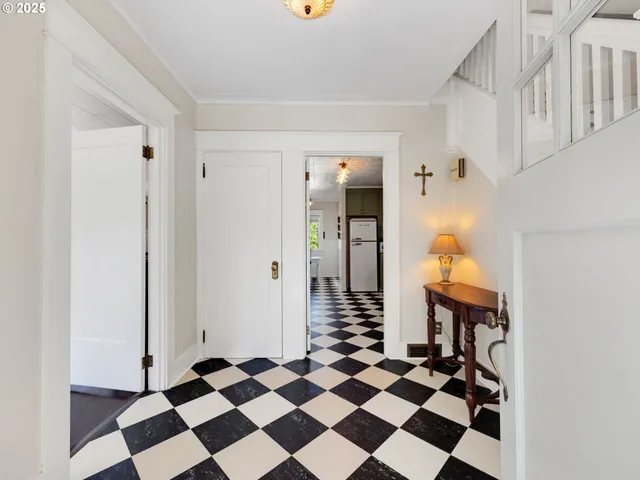 a black and white checkered floor with a black white checkered floor