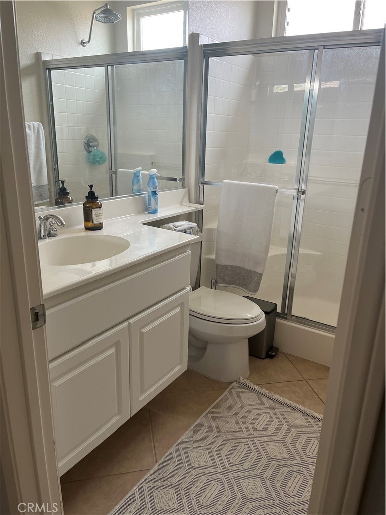68399 Panorama Drive Desert Hot Springs, CA 92240 - Photo 3 of 4 a bathroom with a sink toilet and shower