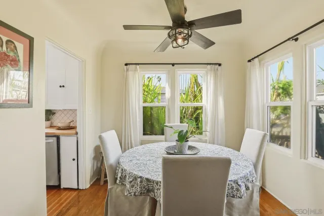 a kitchen with a stove a sink and a refrigerator