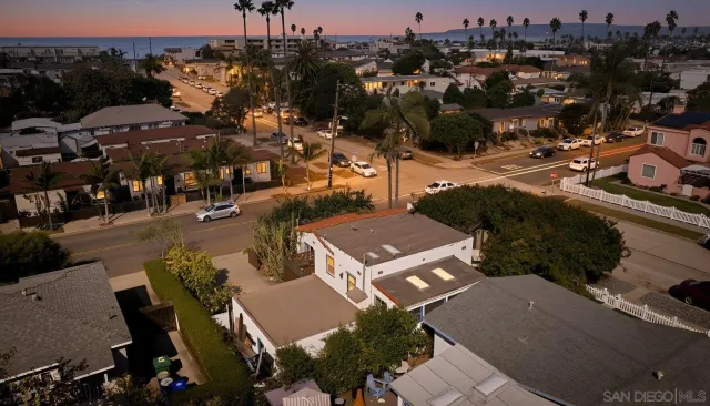 a patio with table and chairs