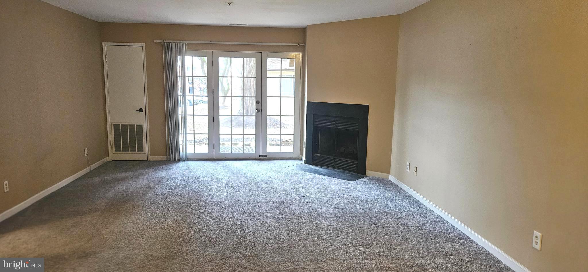 4906 Columbia Road, Unit 4 Columbia, MD 21044 - Photo 3 of 10 Living Room with Fireplace
