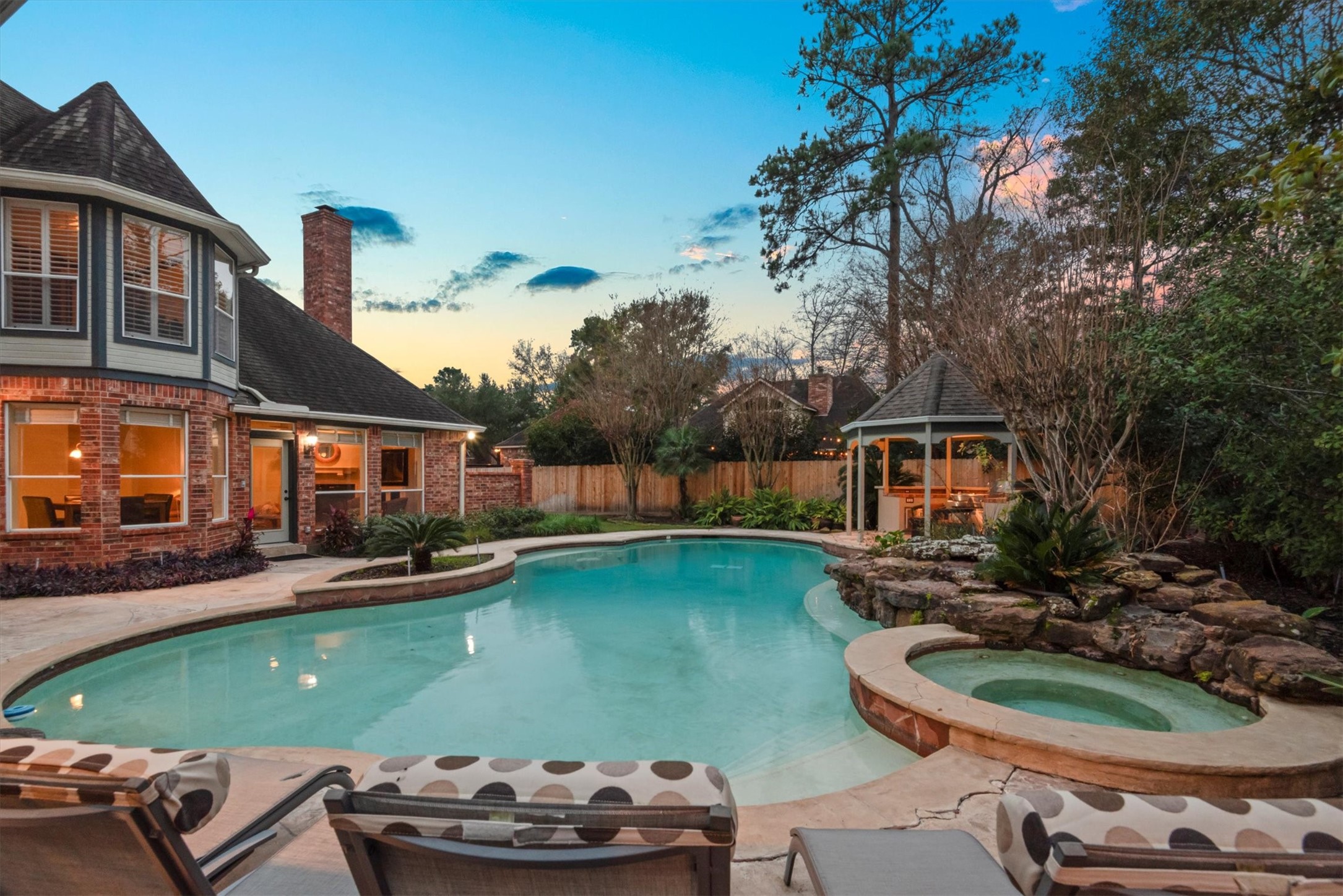 16403 Agusta Court Spring, TX 77379 - Photo 1 of 36 a table and chairs sitting in front of a house