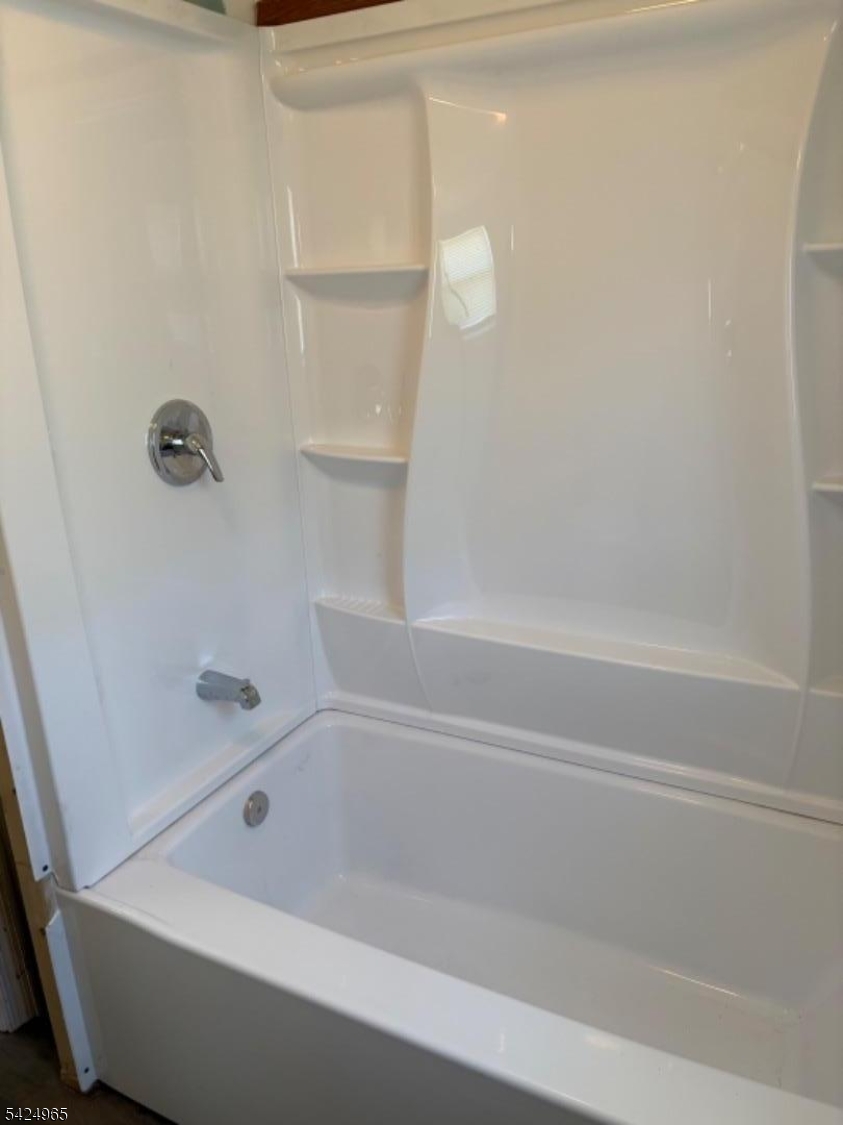 7 Filmore Street, Unit 2 Phillipsburg, NJ 08865 - Photo 13 of 14 a bathroom with a bathtub