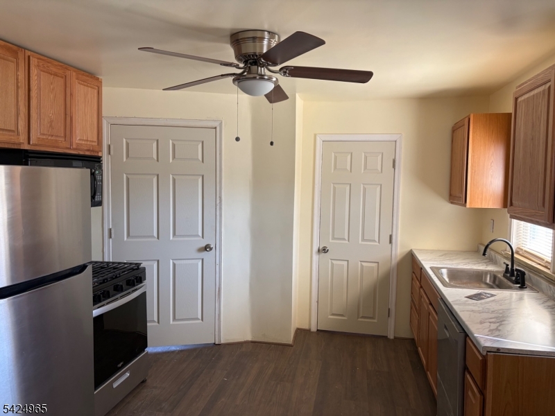 7 Filmore Street, Unit 2 Phillipsburg, NJ 08865 - Photo 6 of 14 a kitchen with stainless steel appliances granite countertop a refrigerator a sink dishwasher and a stove