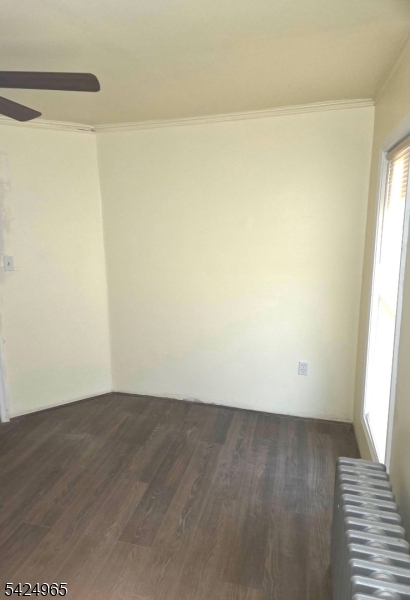 7 Filmore Street, Unit 2 Phillipsburg, NJ 08865 - Photo 10 of 14 an empty room with wooden floor and door