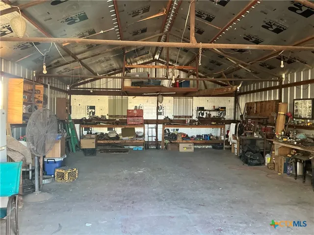 a view of a garage with storage