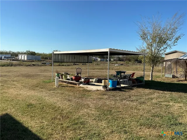 a view of a lake with an outdoor space
