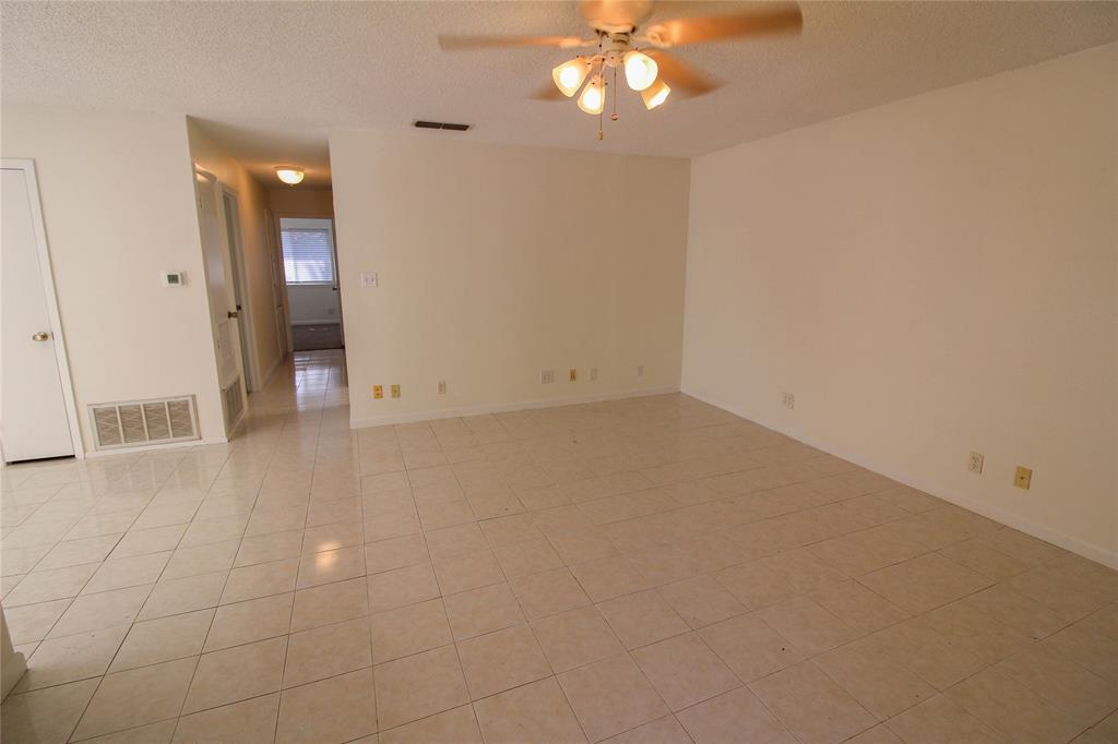 11705 Cherokee Street, Unit B Austin, TX 78753 - Photo 4 of 18 wooden floor in an empty room