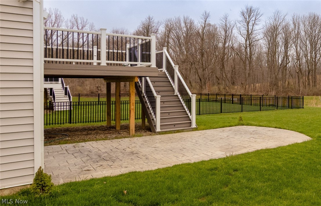 766 River Run Road Aurora, OH 44202 - Photo 43 of 49 Great backyard featuring stairs and a Trex Deck and stamped concrete patio