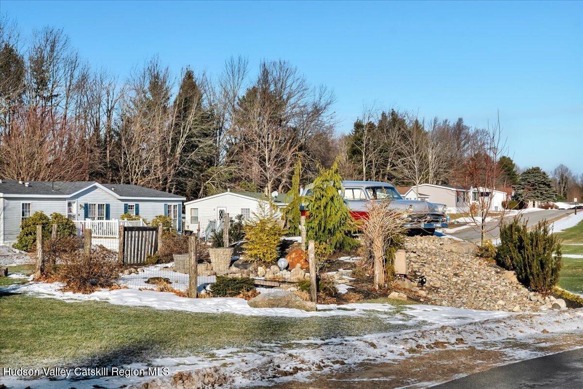 185 Old State Road, Unit 55 Broadalbin, NY 12025 - Photo 42 of 62 a view of a house with a patio