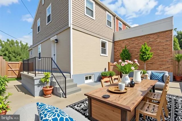 a view of a patio with furniture