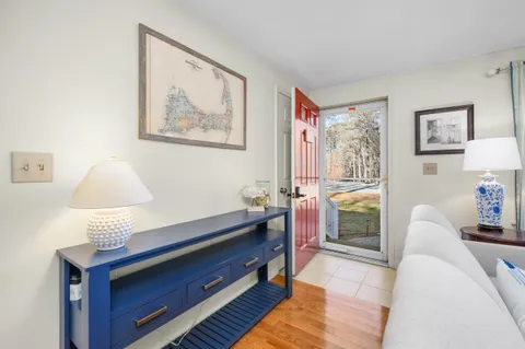 a living room with furniture and a table