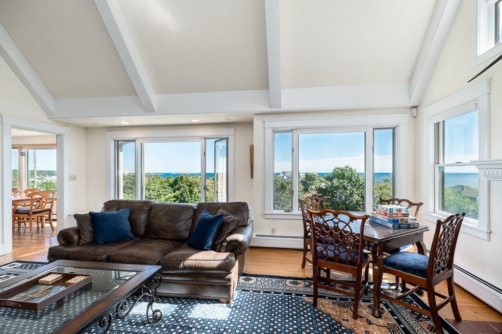 15 Cliff Road Gloucester, MA 01930 - Photo 11 of 42 a living room with furniture and a large window