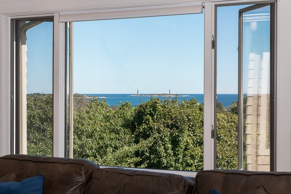 15 Cliff Road Gloucester, MA 01930 - Photo 12 of 42 a view of a back yard from a window