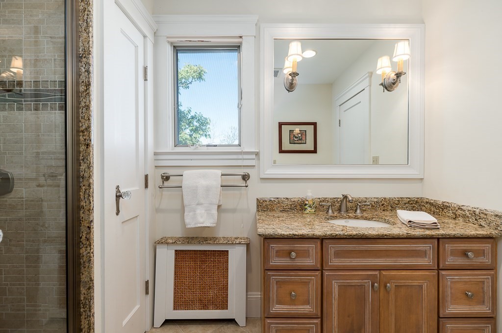 15 Cliff Road Gloucester, MA 01930 - Photo 14 of 42 a bathroom with a sink and a mirror