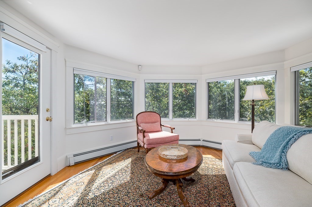 15 Cliff Road Gloucester, MA 01930 - Photo 18 of 42 a living room with furniture and a large window