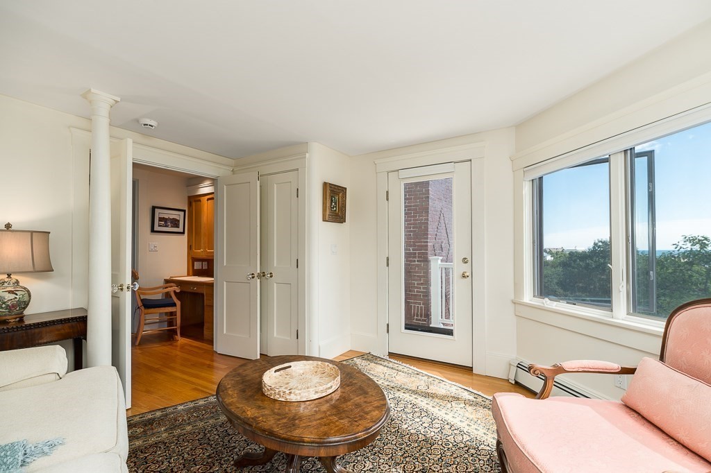 15 Cliff Road Gloucester, MA 01930 - Photo 19 of 42 a living room with furniture and a large window