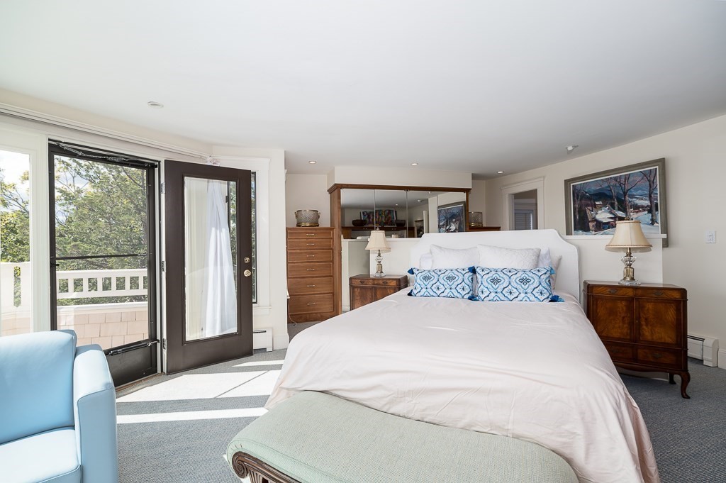 15 Cliff Road Gloucester, MA 01930 - Photo 20 of 42 a bedroom with a large bed and a large window