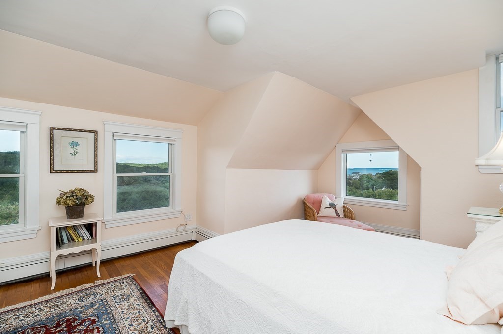 15 Cliff Road Gloucester, MA 01930 - Photo 28 of 42 a bedroom with a bed and window