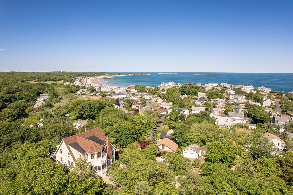 15 Cliff Road Gloucester, MA 01930 - Photo 3 of 42 an aerial view of residential houses with outdoor space and trees